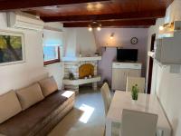 TV a/nebo společenská místnost v ubytování Holiday Home Dorina