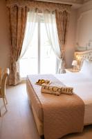 Posteľ alebo postele v izbe v ubytovaní Hotel Conchiglia