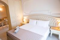 Posteľ alebo postele v izbe v ubytovaní Hotel Conchiglia