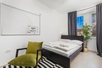 Posteľ alebo postele v izbe v ubytovaní Apartments Harbour View