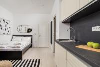 Posteľ alebo postele v izbe v ubytovaní Apartments Harbour View
