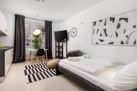 Posteľ alebo postele v izbe v ubytovaní Apartments Harbour View