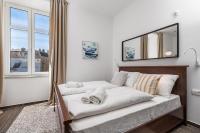 Posteľ alebo postele v izbe v ubytovaní Apartments Harbour View