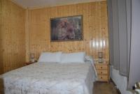 A bed or beds in a room at Casa Rural Consuelo