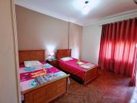 A bed or beds in a room at Joya Apartmento
