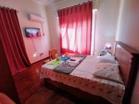 A bed or beds in a room at Joya Apartmento