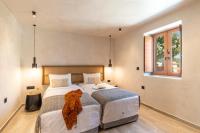 Posteľ alebo postele v izbe v ubytovaní Anastasia Grand Villa