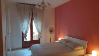 A bed or beds in a room at Appartamento In Paese