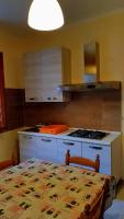 A kitchen or kitchenette at Appartamento In Paese