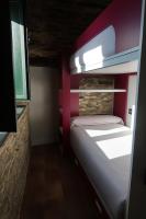 A bed or beds in a room at A Palleira de Lola