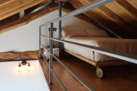 A bed or beds in a room at A Palleira de Lola