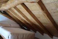 A bed or beds in a room at A Palleira de Lola