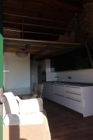 A kitchen or kitchenette at A Palleira de Lola