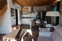 A kitchen or kitchenette at A Palleira de Lola