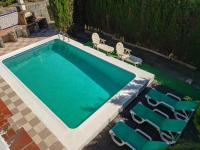 Bazén v ubytovaní Apartamento Vacaciones Granada alebo v jeho blízkosti