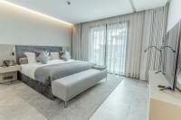 Makass Appart Hotelにあるベッド