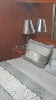 Posteľ alebo postele v izbe v ubytovaní Apartamentos Quien Anda Ahí Ribadeo