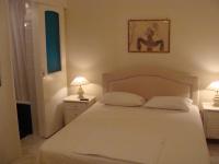 Posteľ alebo postele v izbe v ubytovaní Villa Christina Skiathos