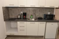 Kuchyň nebo kuchyňský kout v ubytování Splendide Apartments