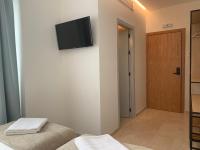 Posteľ alebo postele v izbe v ubytovaní Sweet Sevilla Suites
