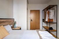 Posteľ alebo postele v izbe v ubytovaní Sweet Sevilla Suites