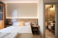Posteľ alebo postele v izbe v ubytovaní Sweet Sevilla Suites