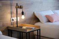 Posteľ alebo postele v izbe v ubytovaní Sweet Sevilla Suites
