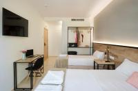 Posteľ alebo postele v izbe v ubytovaní Sweet Sevilla Suites