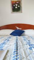 Posteľ alebo postele v izbe v ubytovaní Guesthouse Podaca