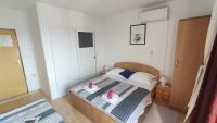 Posteľ alebo postele v izbe v ubytovaní Guesthouse Podaca