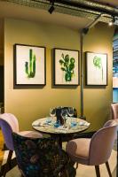 a dining room with a table and chairs at The Chamberlain in London