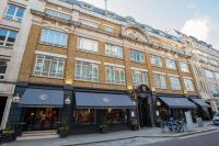 a large brick building on a city street at The Chamberlain in London