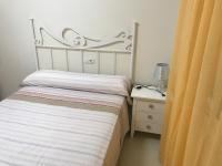 Posteľ alebo postele v izbe v ubytovaní Atico con piscina privada y vistas al mar