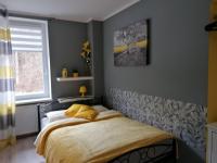 Posteľ alebo postele v izbe v ubytovaní Apartament Grosik