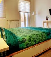 A bed or beds in a room at casa vacanze Sleep Art