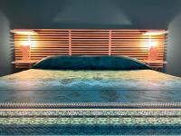 A bed or beds in a room at casa vacanze Sleep Art
