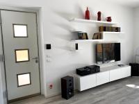 A television and/or entertainment centre at casa vacanze Sleep Art
