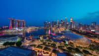 a view of a city at night at PARKROYAL COLLECTION Marina Bay, Singapore in Singapore