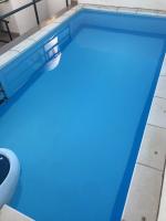 Bazén v ubytovaní Atico con piscina privada y vistas al mar alebo v jeho blízkosti