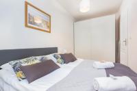Posteľ alebo postele v izbe v ubytovaní Apartments Varsovia Kasprzaka by Noclegi Renters