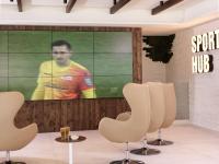 a room with chairs and a large screen at Atlantica Dreams Resort in Gennadi