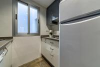 A kitchen or kitchenette at H2Granada en Centro Terraza-solarium & Parking
