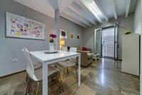 A seating area at H2Granada en Centro Terraza-solarium & Parking