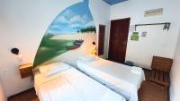 Cama ou camas em um quarto em Local Hostel Manaus