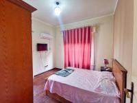A bed or beds in a room at Joya Apartmento