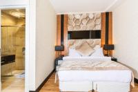 Postel nebo postele na pokoji v ubytování Eastanbul Suites