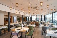 Reštaurácia alebo iné gastronomické zariadenie v ubytovaní Mountains Hotel