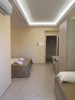 A bed or beds in a room at Vittorio Veneto Accomodation - Tropea city center