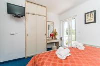 Posteľ alebo postele v izbe v ubytovaní Hotel Dubrovnik