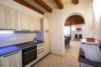A kitchen or kitchenette at La Cava dei Sogni
